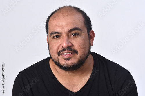 portrait of a latin american man on white background,