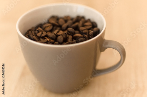 cup of coffee with beans