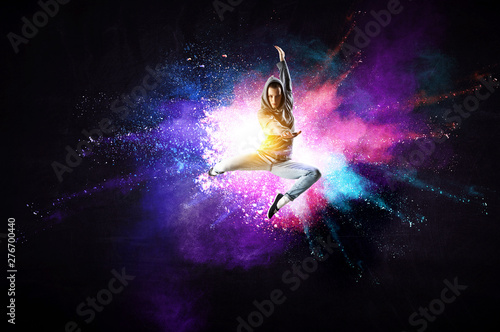 Modern female dancer jumpin...