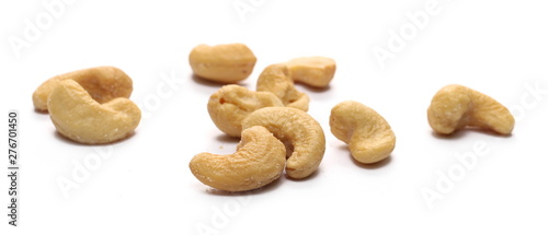 Salted cashew nuts isolated on white background