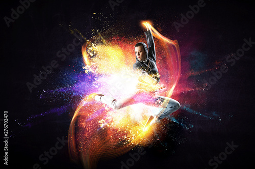 Modern female dancer jumpin...