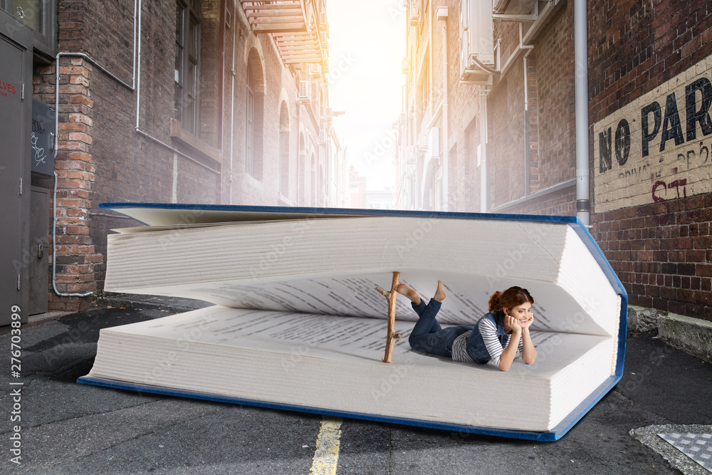 Little woman with large book concept - obrazy, fototapety, plakaty 