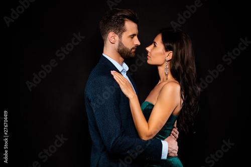 Profile side view portrait of his he her she nice-looking attractive shine glamorous lovely luxurious passionate two person St Valentine day isolated over black background