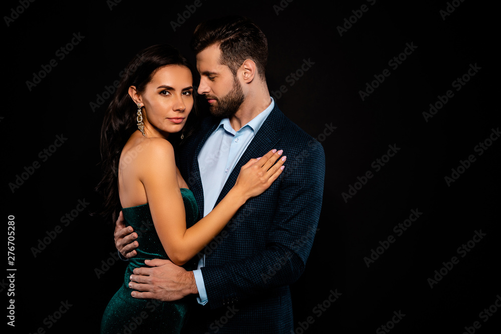 Close up side profile photo beautiful she her wife bride he him his husband fiance mrs mr married spouse protect hands slim waist hold close wear costume jacket green dress isolated black background Close up side profile photo beautiful she her wife bride he him his husband fiance mrs mr married spouse protect hands slim waist hold close wear costume jacket green dress isolated black background