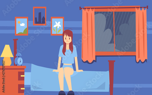 Sad sleepy woman or girl woke up in the morning in bedroom and sat on the bed in a bad mood.