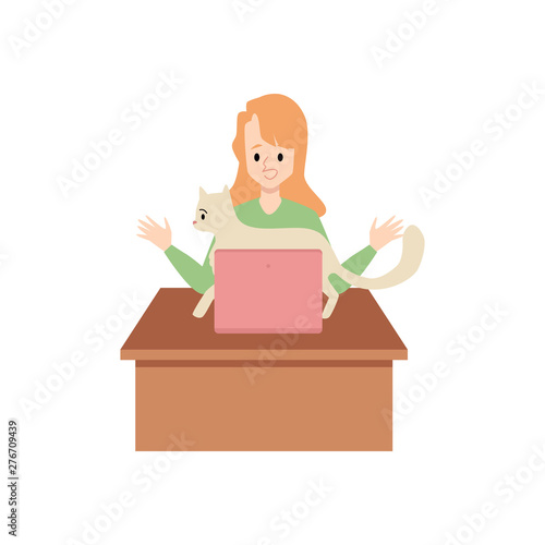 Woman works on a laptop and a cat tries to get attention flat vector illustration.