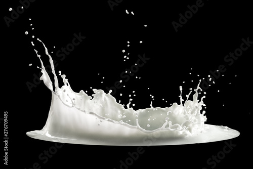 milk splash isolated on black background