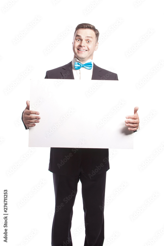 Funny man in suit holds white sheet. Funny man in suit holds white sheet.