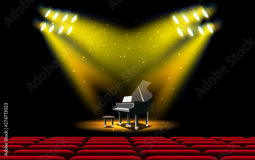 piano and spotlight on the stage in the hall