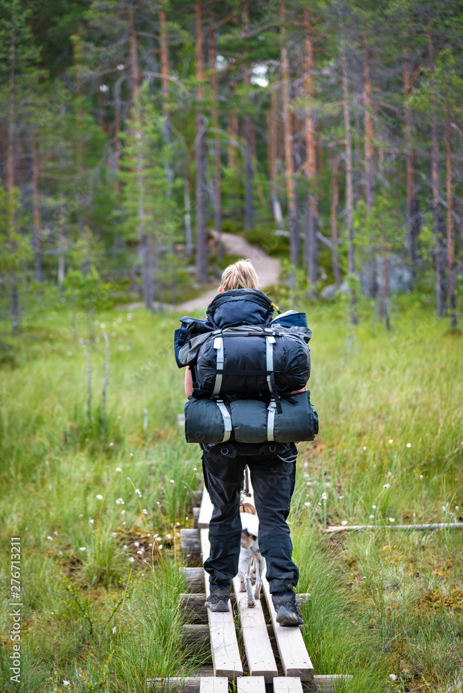 Wooman hiking in forest Wooman hiking in forest