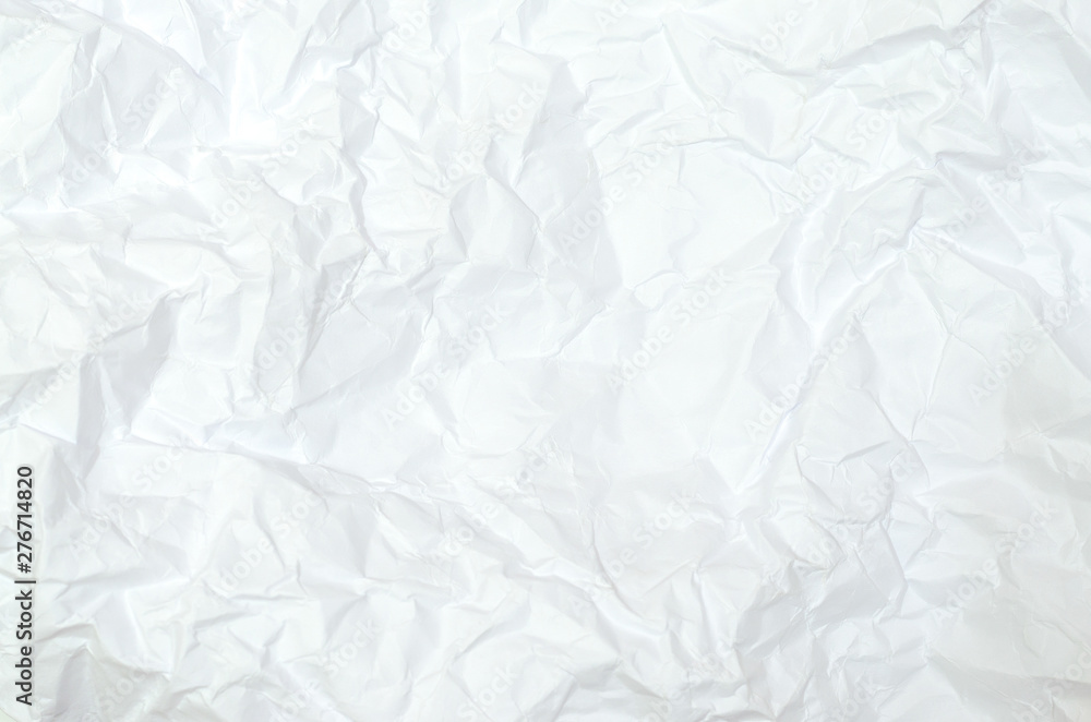 White crumpled paper texture background. creased paper. White crumpled paper texture background. creased paper.