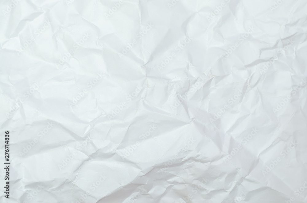 White crumpled paper texture background. creased paper. White crumpled paper texture background. creased paper.