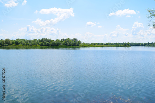 Large wide lake in nature. Summer landscape.