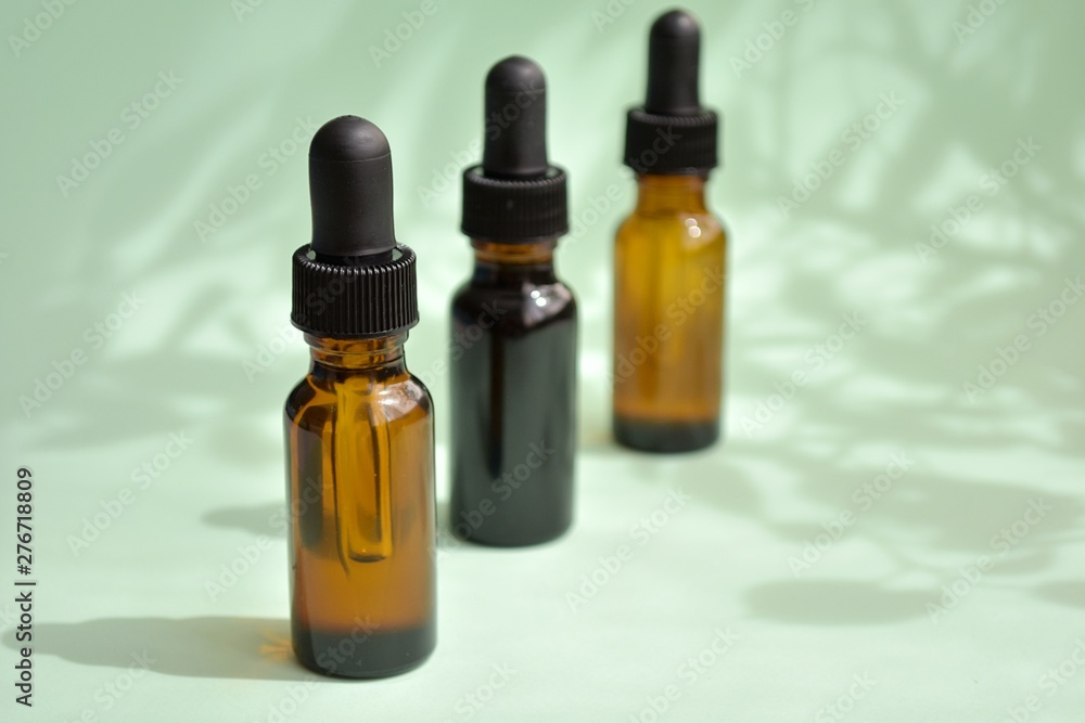 Beauty products from nature, aromatherapy, dropper bottles with cosmetic oil for skin treatment. Beauty products from nature, aromatherapy, dropper bottles with cosmetic oil for skin treatment.