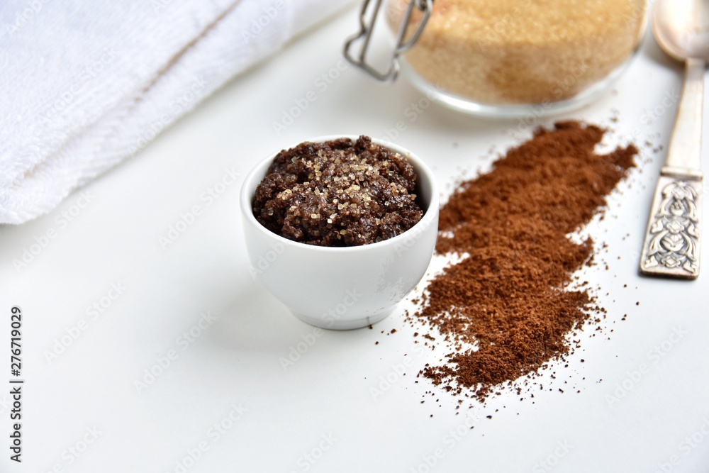 Lip scrub in small bowl made with coffee, brown sugar and honey. Lip scrub in small bowl made with coffee, brown sugar and honey.