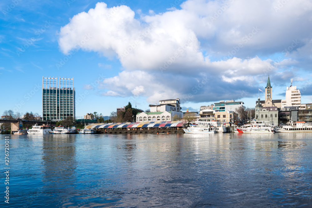 Naklejka premium Valdivia, Region de Los Rios, Chile - View of downtown Valdivia across the Calle Calle River.