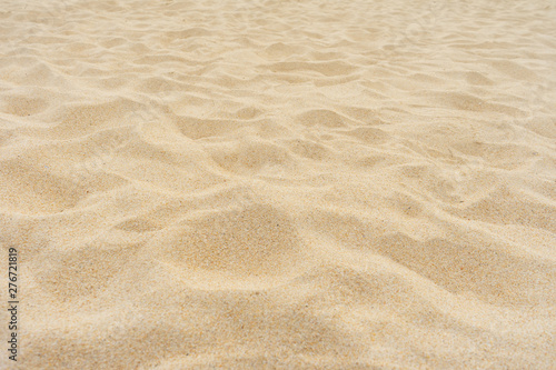 Yellow beach sand texture. © BUDDEE
