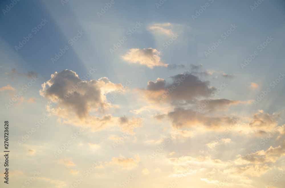 Sky background with clouds at sunrise