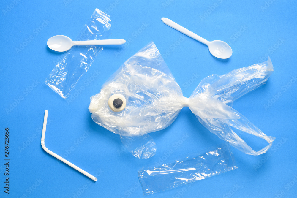 stop ocean plastic pollution and saving the environment concept. fish from a plastic bag. stop ocean plastic pollution and saving the environment concept. fish from a plastic bag.