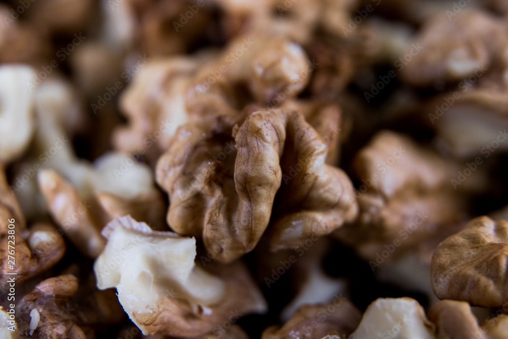 walnuts kernel on a gray wooden board walnuts kernel on a gray wooden board