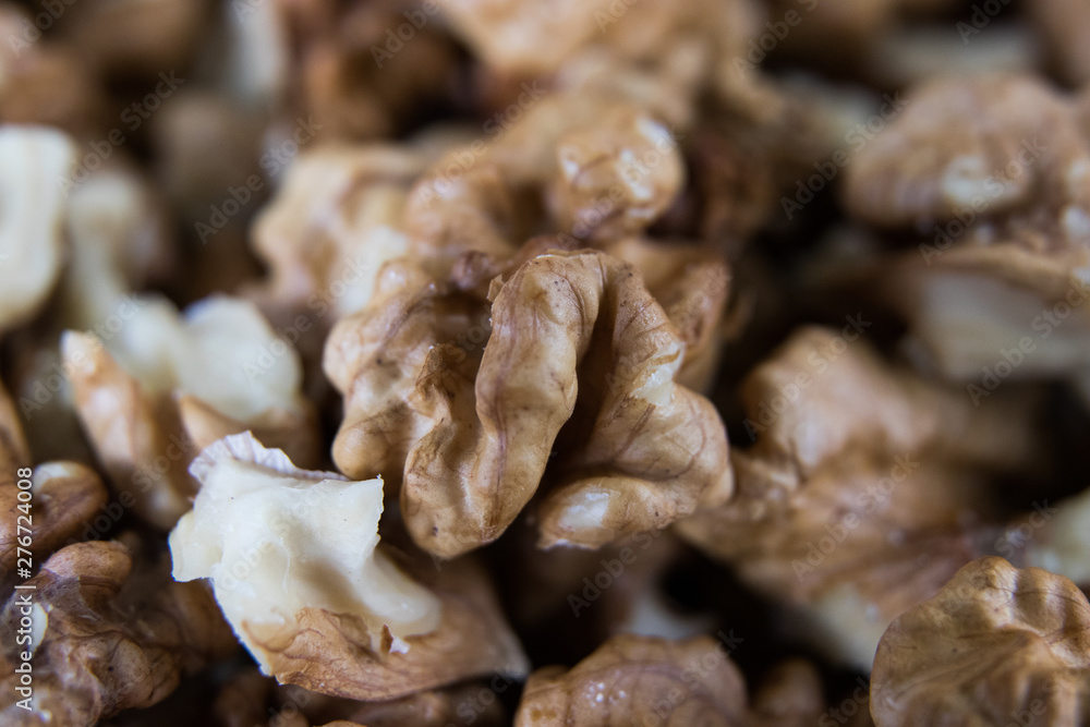 Fototapeta premium walnuts kernel on a gray wooden board