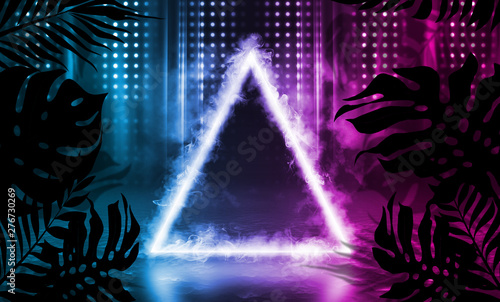 Background of empty dark scenes with neon lights and shapes  smoke. Silhouettes of tropical palm leaves in the foreground. Bright futuristic abstract background