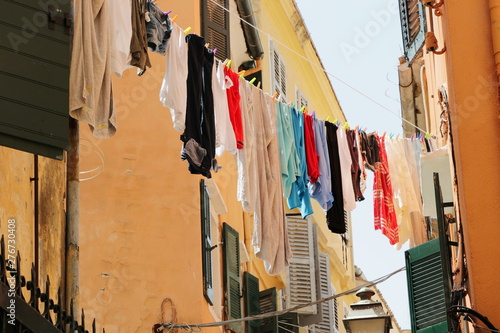 Hanging laundry on a narrow street in Corfu Greece © sal73it