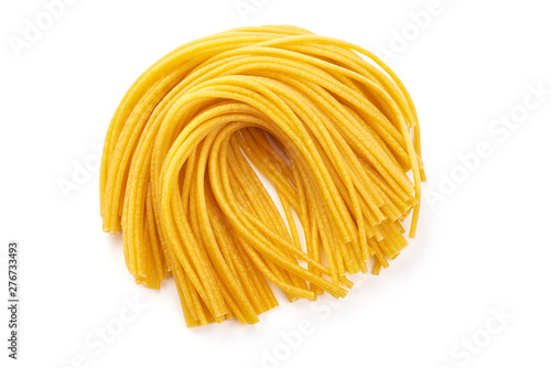 Italian pasta, raw spaghetti, top view, isolated on white background