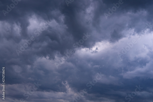 Dramatic thunderstorm clouds. Creative vintage background.