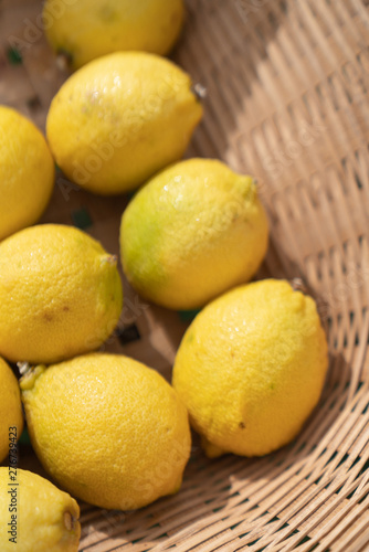 Composition of lemons setting in basket in natural light scene   food material   food background   raw material   food photography
