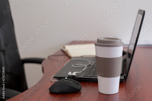 Laptop on a table at modern office