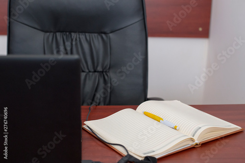 Laptop on a table at modern office