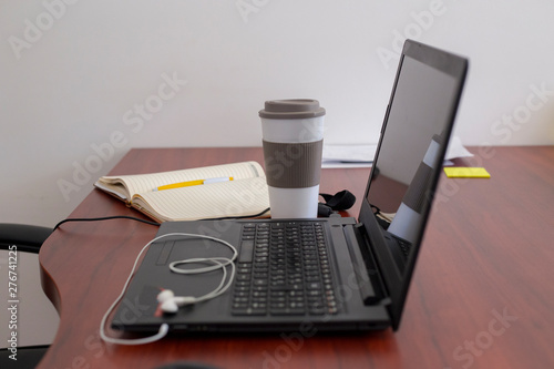 Laptop on a table at modern office