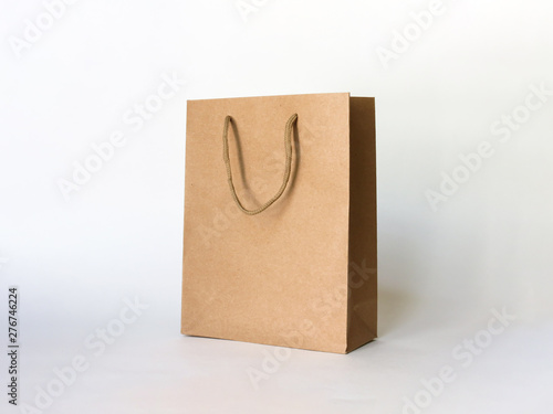 Empty Brown Paper Shopping Bag for advertising and branding isolated on white Background. Mock up. High Resolution. Mockup for design