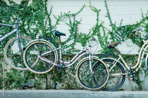 bicycle is on the wall at Tha Maharat, Maharat Pier, Bangkok Thailand photo