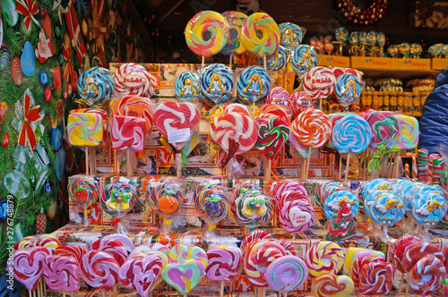Christmas lollipops of different colors  flavors and shapes at the Christmas market