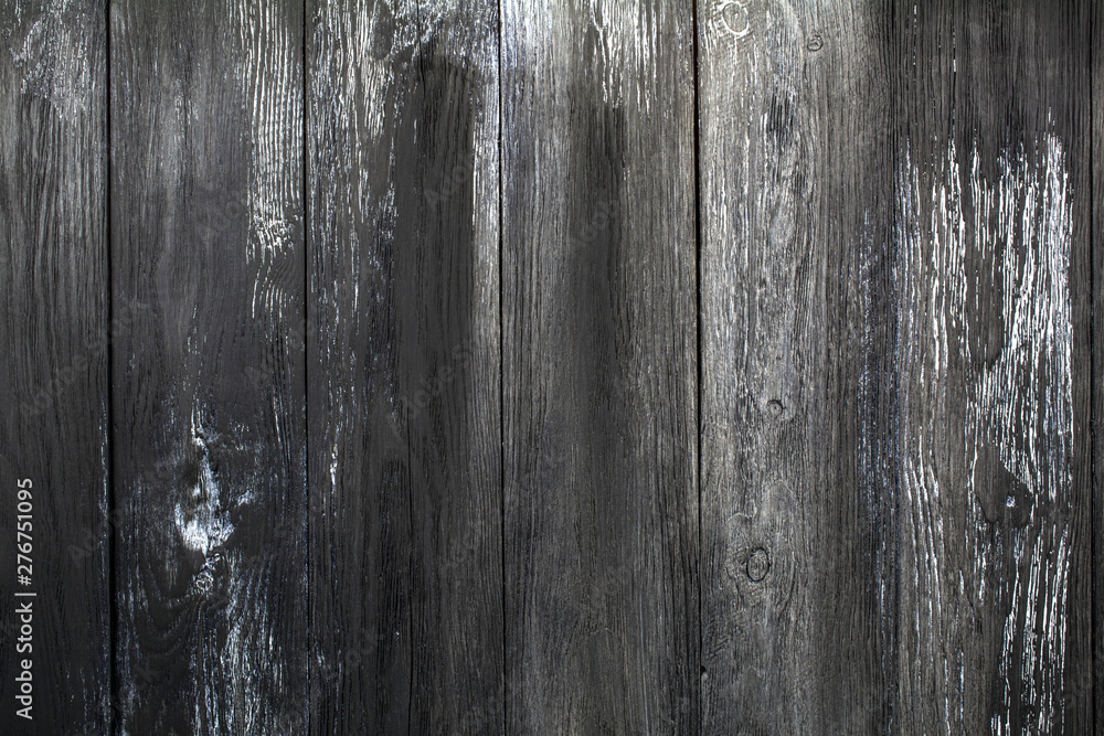 Surface from old, dark boards located a peak. Surface from old, dark boards located a peak.