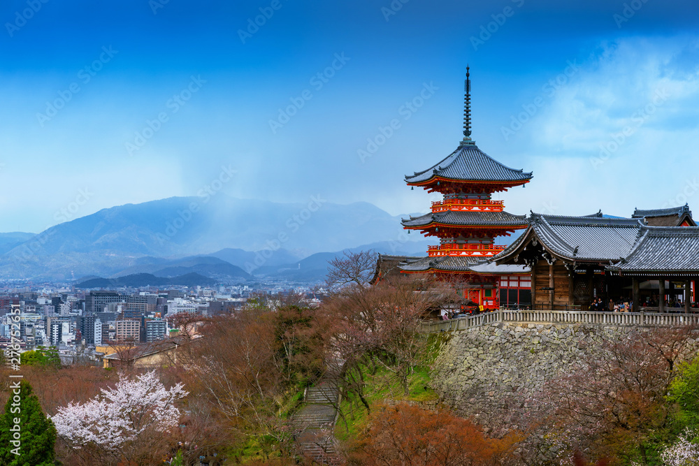 Red pagoda and Kyoto cityscape in Japan.