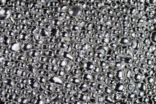Pure silver granule texture. Background from silver pellets.