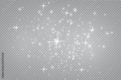 The dust is yellow. yellow sparks and golden stars shine with special light. Vector sparkles on a transparent background. Christmas light effect. Sparkling magical dust particles.