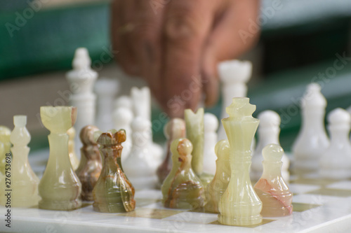 Photography Chess game: grandmaster makes a move