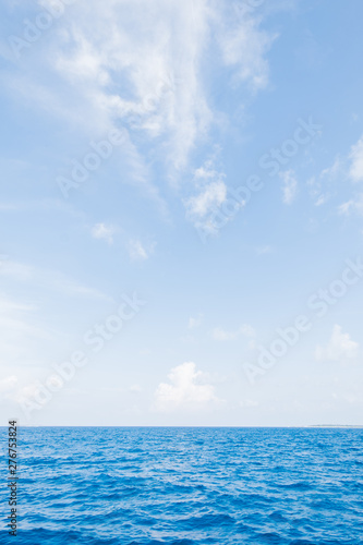 Calm Sea and Blue Sky Background in Maldives © wassamon