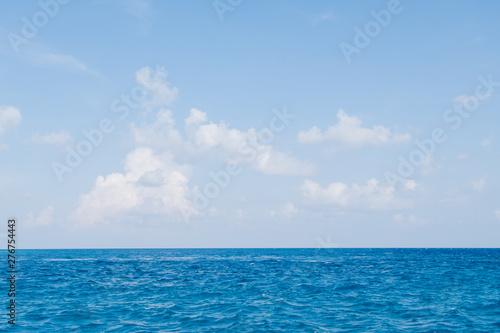 Calm Sea and Blue Sky Background in Maldives © wassamon