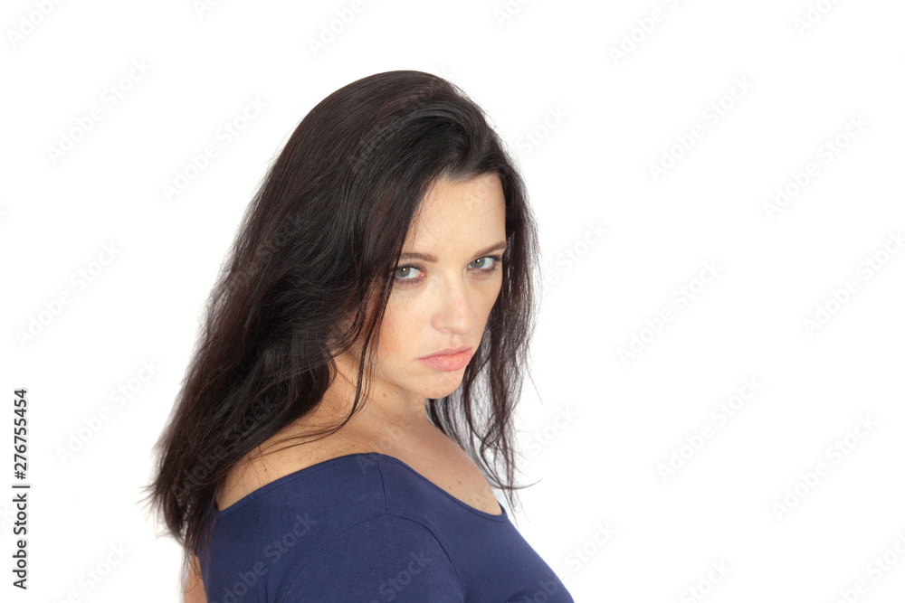 Young angry brunette woman portrait on white background. Concept emotion anger Young angry brunette woman portrait on white background. Concept emotion anger