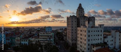 Aerial Panoramic view of the residential neighborhood in the Havana City  Capital of Cuba  during a colorful cloudy sunset.