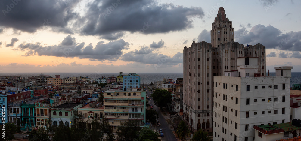 Aerial Panoramic view of the residential neighborhood in the Havana City, Capital of Cuba, during a colorful sunset.