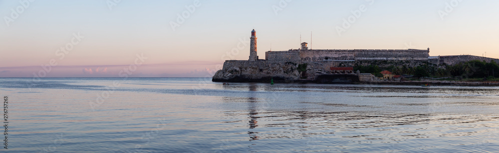 Panoramic view of the Lighthouse in the Old Havana City, Capital of Cuba, during a colorful and sunny sunrise.