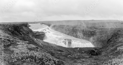 Gullfoss waterfall, amazing nature, Icelandic summer landscape. Scenic panoramic view of falling water in the canyon of Hvita river, southwest Iceland. Outdoor travel background, black and white image