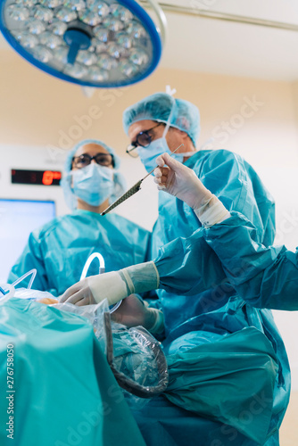 Team of surgeons operating in the hospital