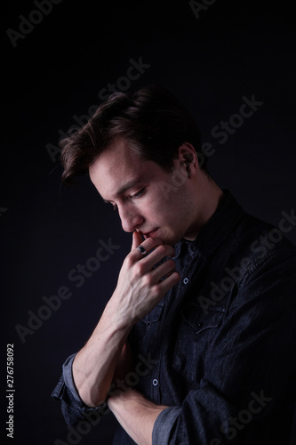 Young caucasian adult posing in the studio